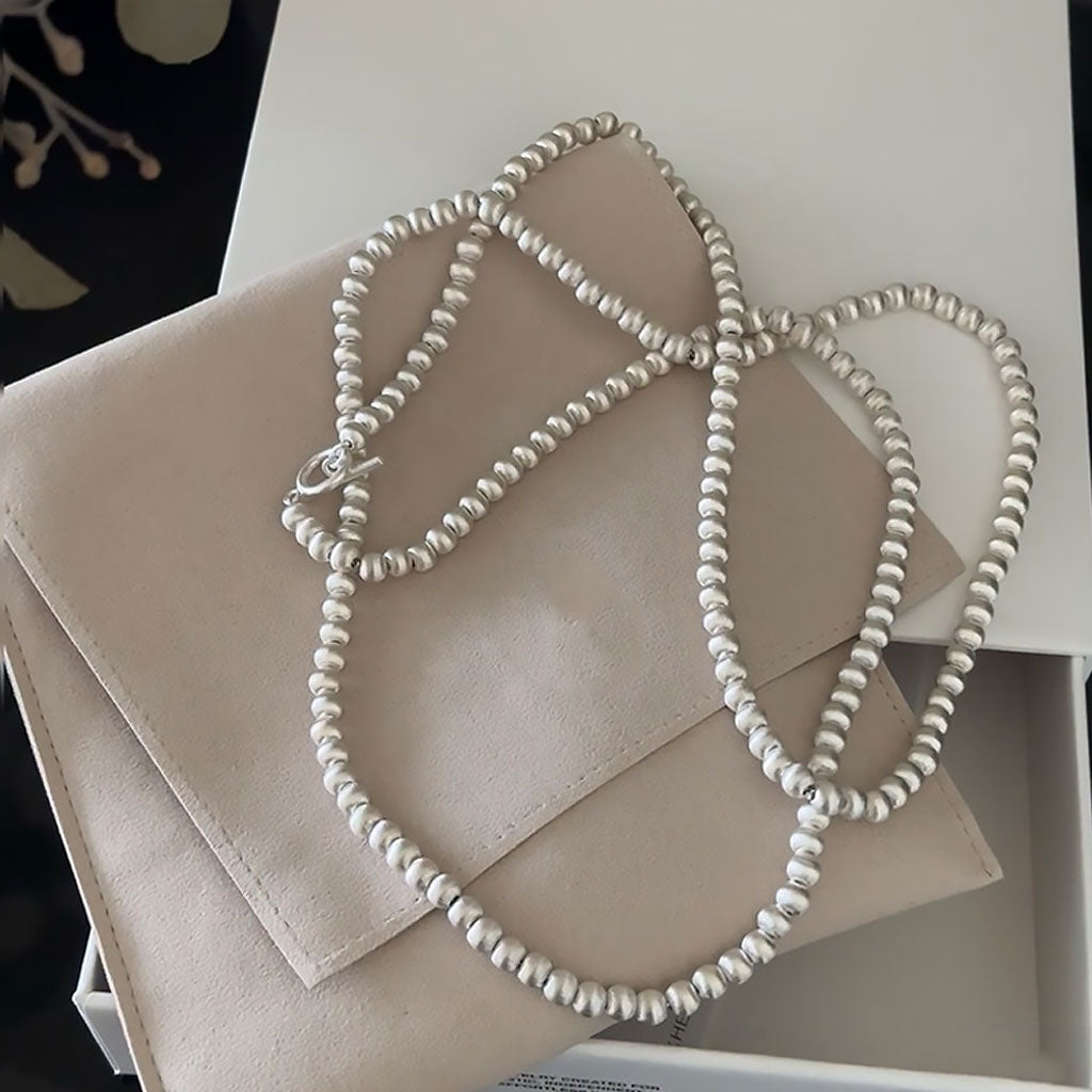 Quiet Luxury Brushed Satin Ball Silver Lariat Necklace