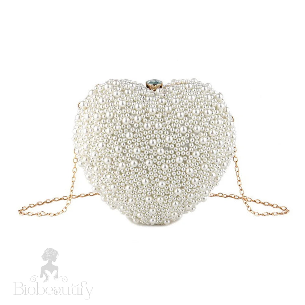 Beige Heart Shaped Clutch Bag With Luxury Metal Handle And Pearl Beads