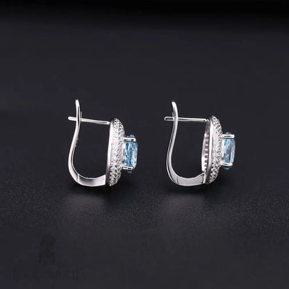 Blue Topaz Halo Cluster Stud Earrings With Clear Cubic Zirconia