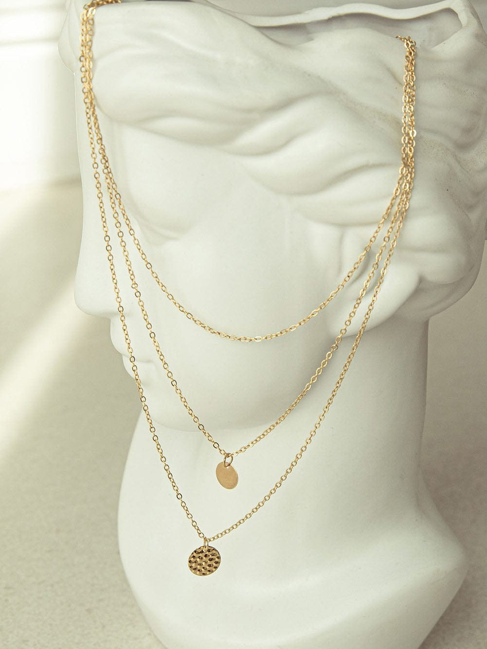 Layered Copper Pendant Necklace With Multiple Chains In Gold