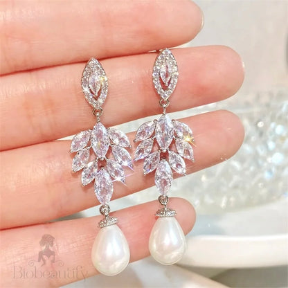 Paloma Pearly Cubic Zirconia Bridal Earrings In Gold And Silver