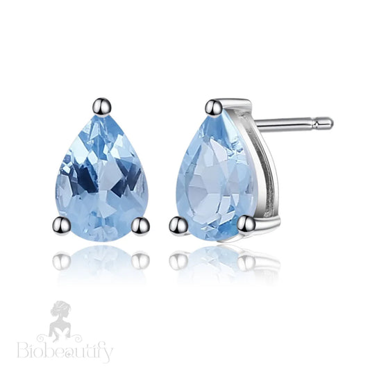 Pear Shaped Swiss Blue Topaz Halo Stud Earrings / One Size