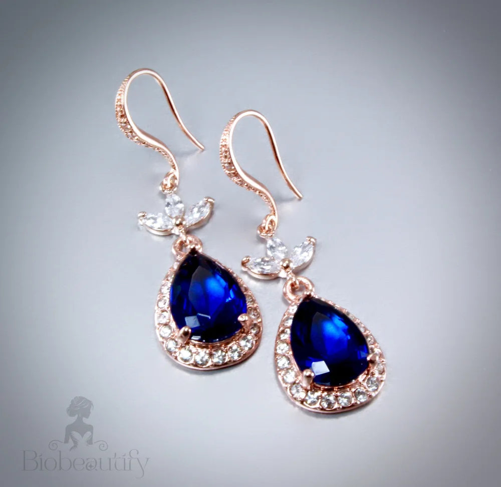 Skye Bridal Earrings With Rose Gold And Sapphire Blue Cubic Zirconia